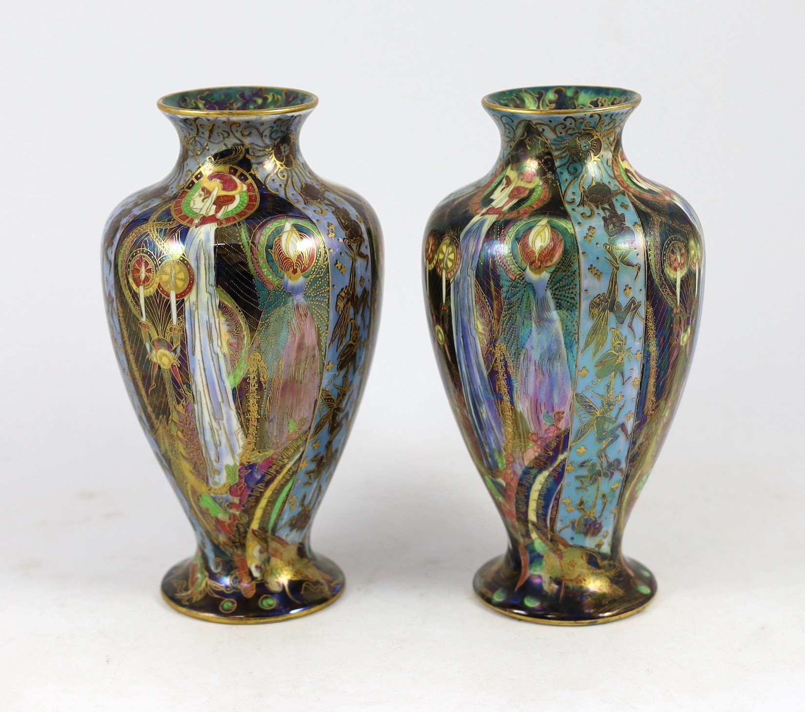 N.B. RESTORATION TO ONE VASE A pair of Wedgwood ’Candlemas’ Fairyland lustre vases, designed by Daisy Makeig-Jones, 21.5cm high